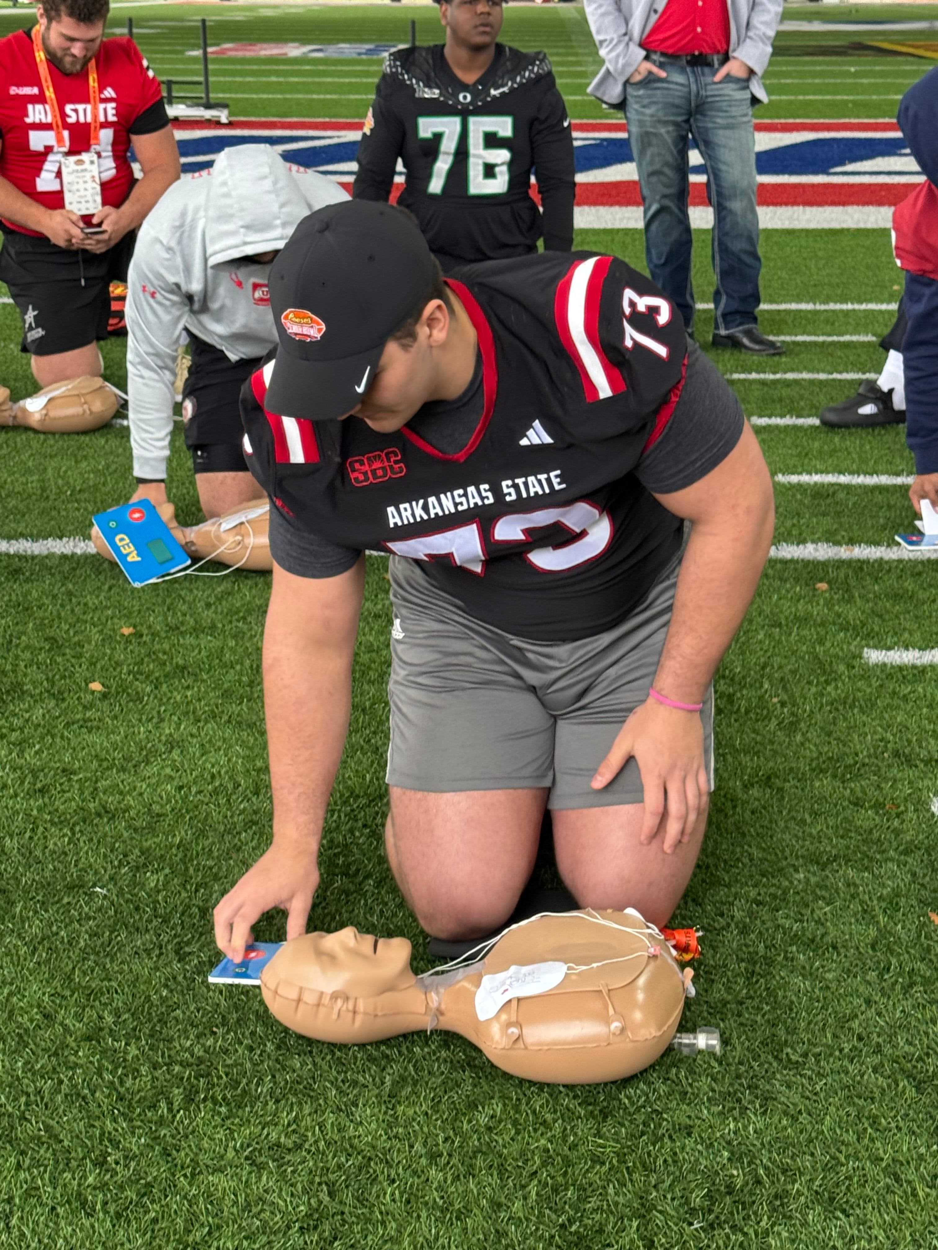 Senior Bowl Players Learn Life-Saving CPR Skills, Join Nation of Lifesavers