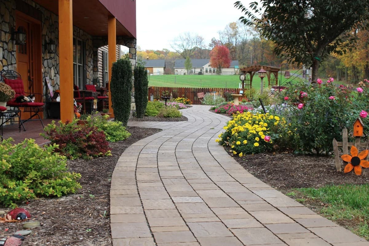 Individual Paver Replacement Cuts Driveway Repair Costs: A Plus Landscaping Highlights Advantages Over Concrete