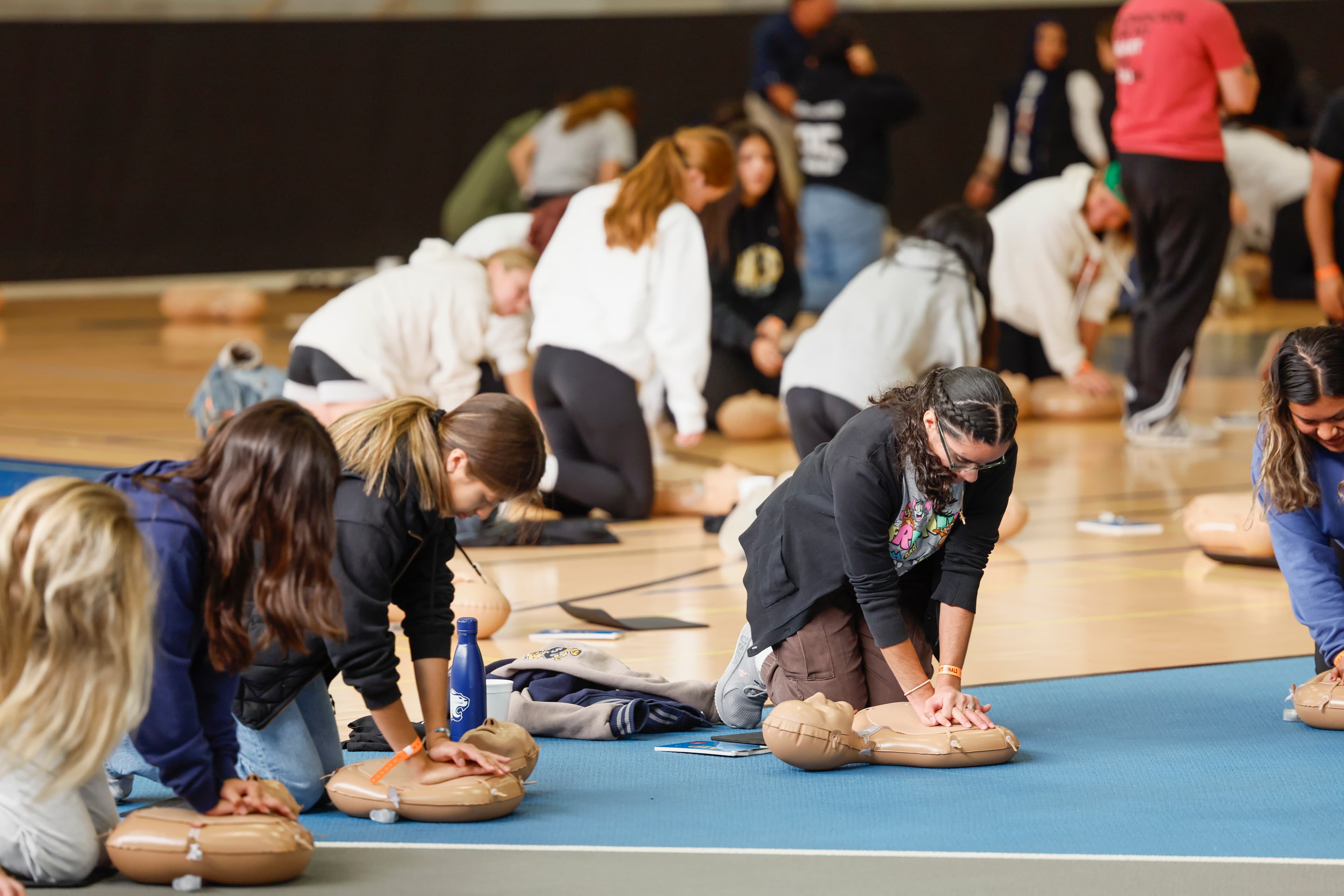 Chicago Bears Partner with American Heart Association to Train Youth Athletes in CPR